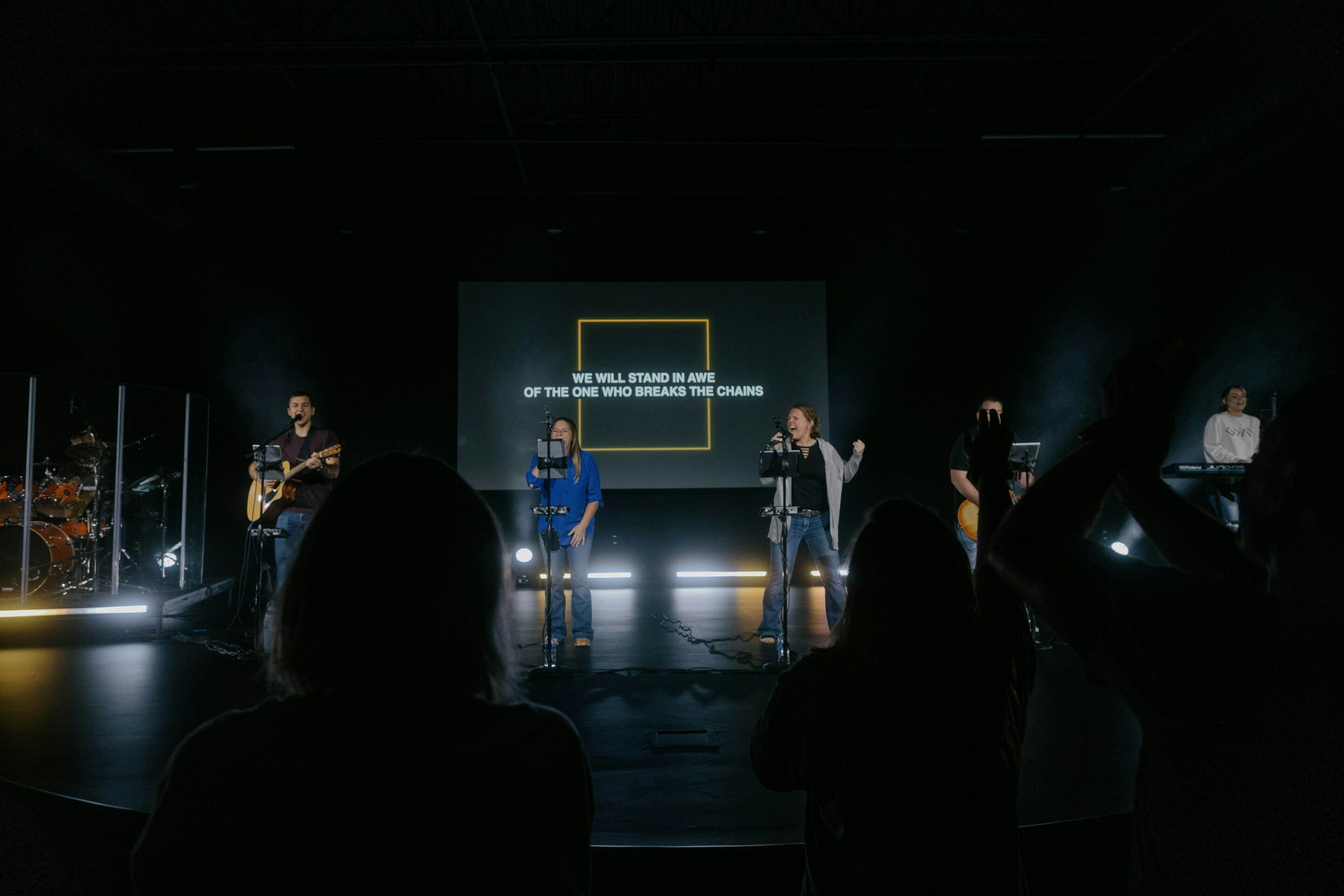 church worship service with worship lyrics on screen from church presentation software