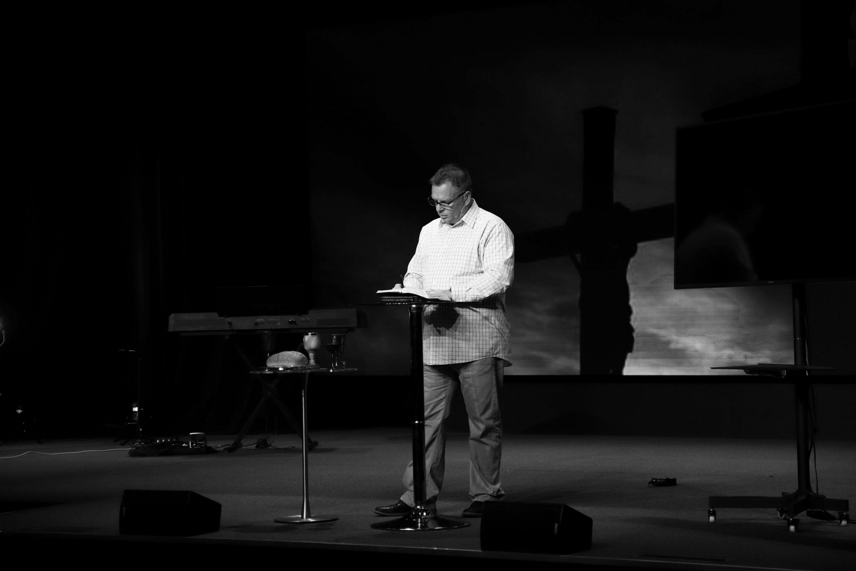 pastor using visuals for teaching time displayed by church presentation software