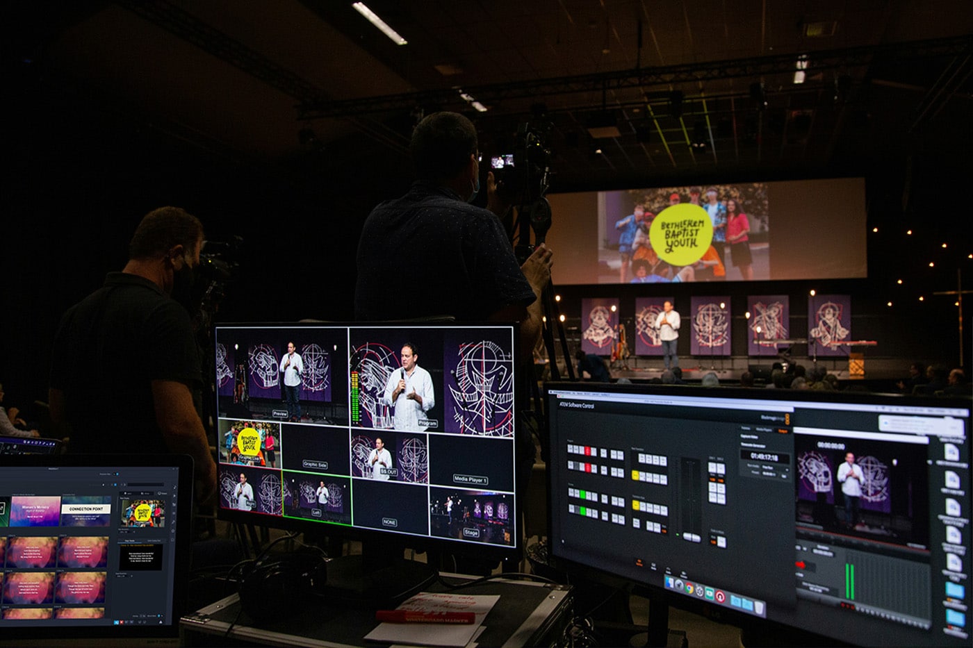 mediashout presentation software on screen next to a video mixer and switcher at a church